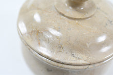 Load image into Gallery viewer, White polished marble pet ashes casket lid close up.