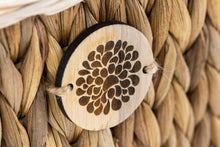 Load image into Gallery viewer, Handwoven water hyacinth pet coffin badge close up.