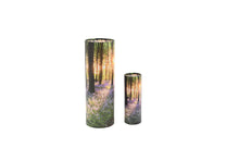 Load image into Gallery viewer, Large and small cylindrical pet ashes scattering tubes with a bluebell woodland image.