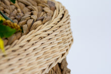 Load image into Gallery viewer, Handwoven water hyacinth pet coffin corner close up.
