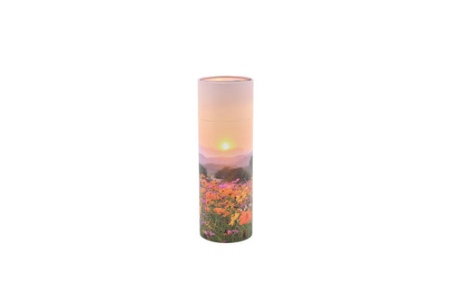 Large cylindrical pet ashes scattering tube with a flower meadow image.