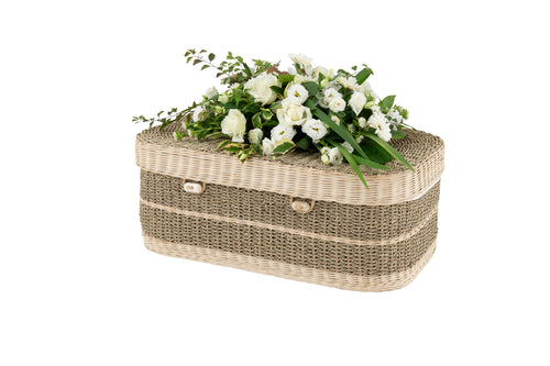 Handwoven seagrass pet coffin in small.